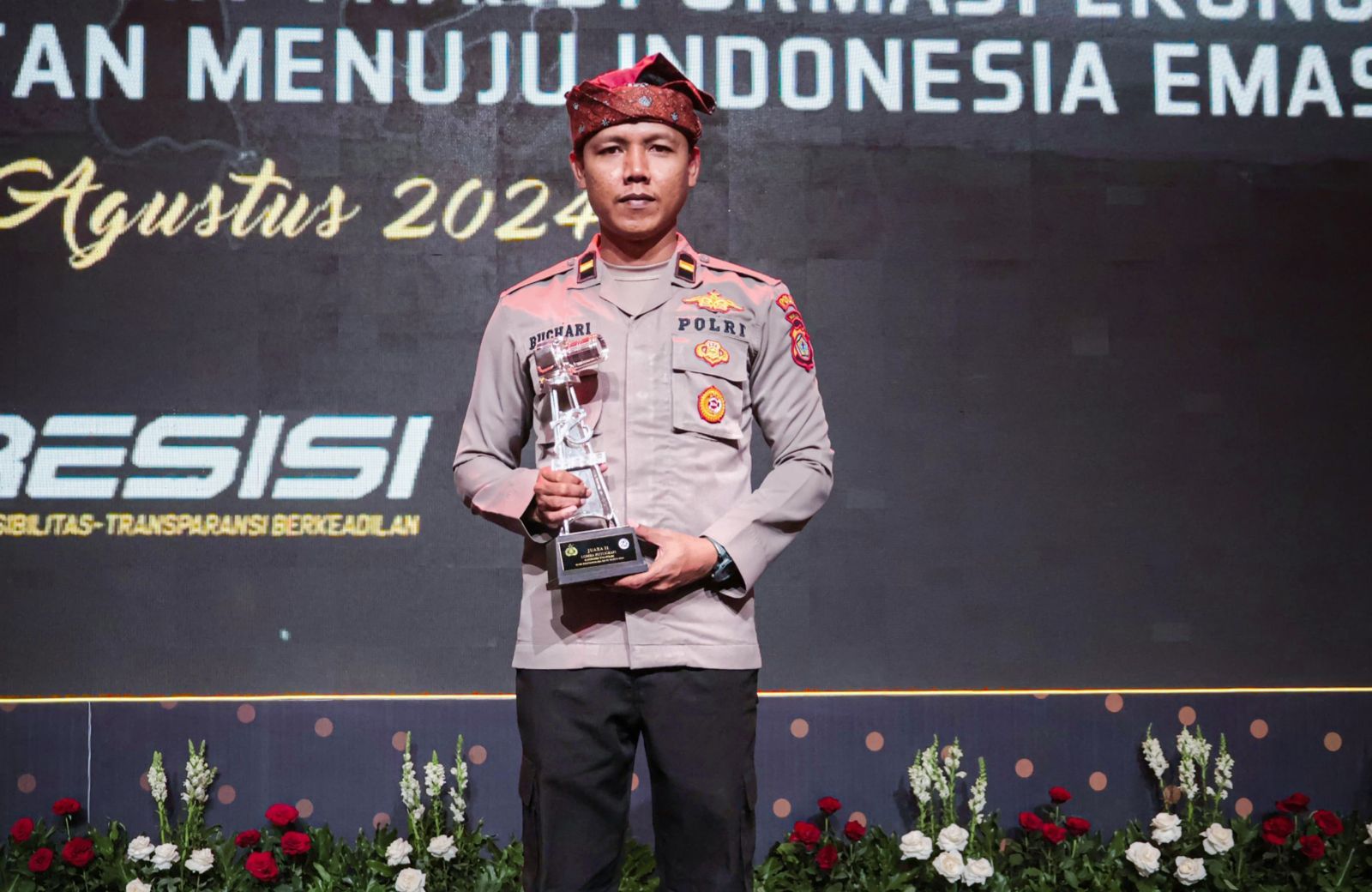 Ipda Buchari Anggota Polres Buru Selatan Raih Juara 1 Lombar Fotografi Polri