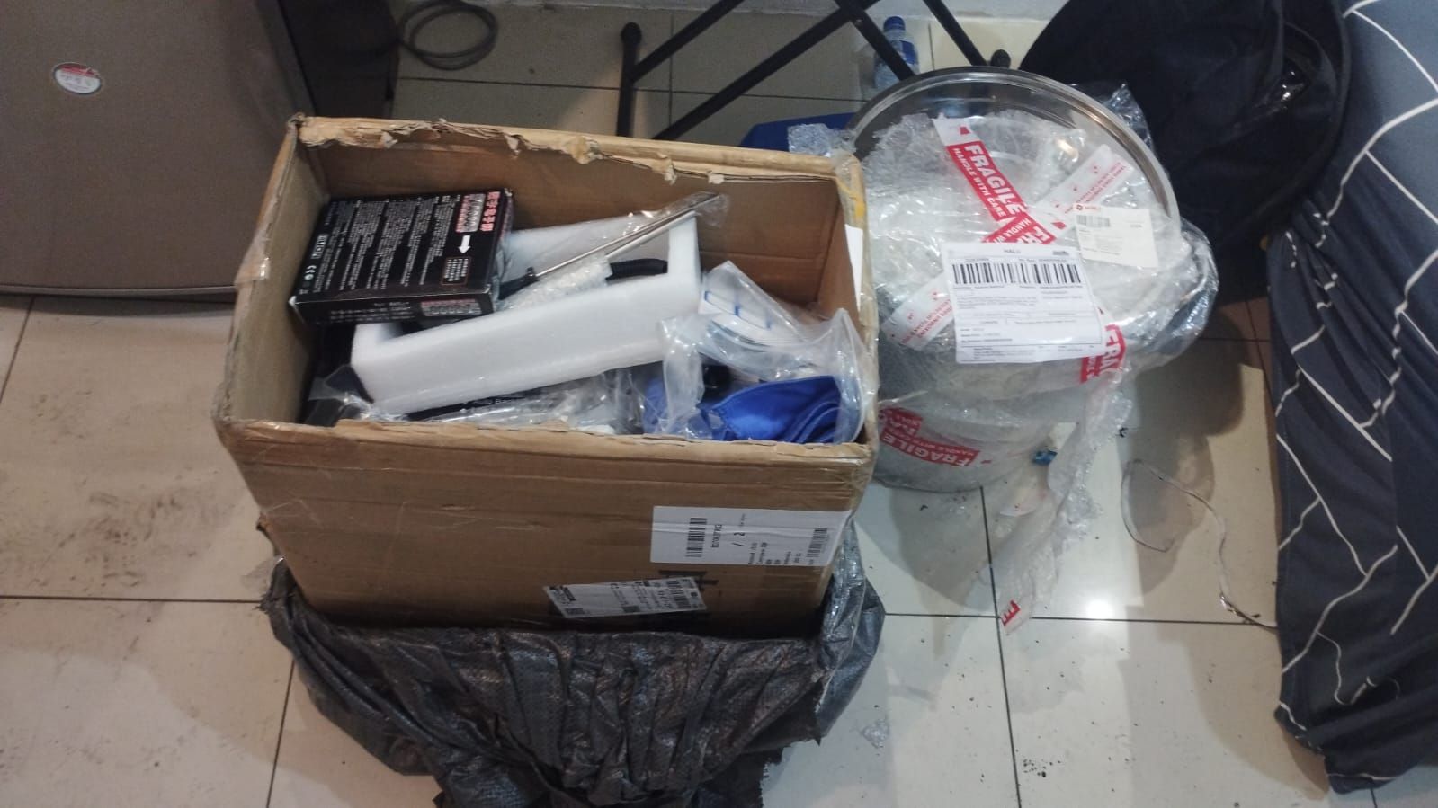 Polisi Bongkar Laboratorim Produksi Etomidate di Apartemen Pluit, WNA Tiongkok Ditangkap!