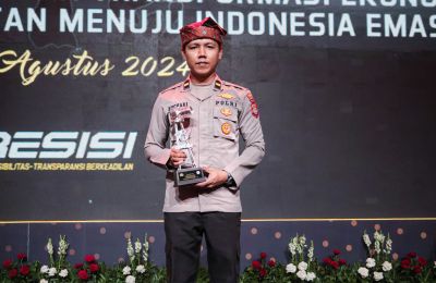 Ipda Buchari Anggota Polres Buru Selatan Raih Juara 1 Lombar Fotografi Polri