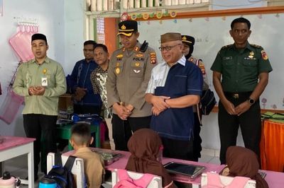 746 Paket Makanan Bergizi Dibagikan untuk Siswa di Limboto