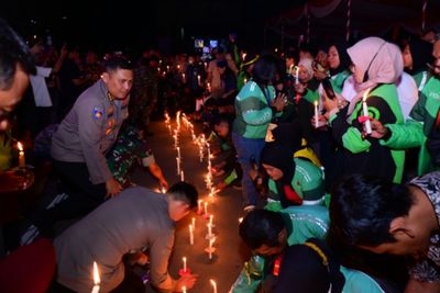 Polda Jambi Gelar Doa Bersama dan Aksi 1000 Lilin untuk Perdamaian