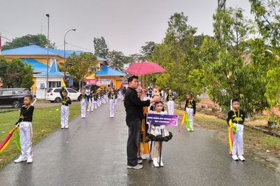 Antusiasme Peserta Hulonthalo Marching Festival 2025 Meski Diguyur Hujan