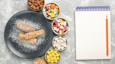 Risiko Kesehatan Tersembunyi di Balik Kebiasaan Mengemil Makanan Manis
