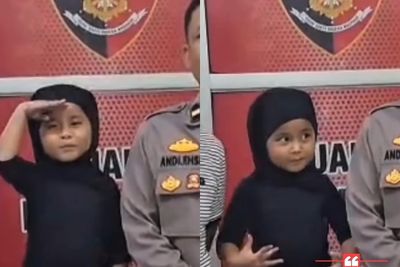 Bukannya Nangis, Bocah Hilang yang Bikin Panik Ibunya Ini Malah Pose Santai di Kantor Polisi