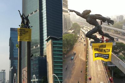 Relawan Greenpeace Panjat Tugu Pancoran Dipulangkan