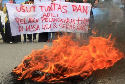FOTO: Aksi Peringatan Hari HAM Sedunia di Berbagai Daerah