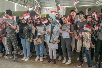 FOTO: Senyum Bahagia Iringi Pemulangan 238 WNI dari Natuna