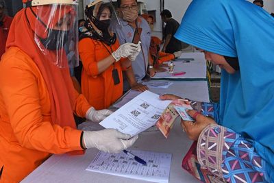 FOTO: Pencairan Bantuan Sosial Uang Tunai