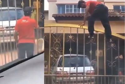 Viral Kurir Nekat Panjat Pagar karena Takut Anjing