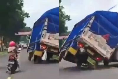 Elakkan Emak-emak yang Berhenti di Tengah Jalan, Truk Oleng Hingga Nyaris Timpa Mobil