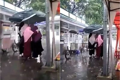 Ukhti-Ukhti Pakai Tenda Stan Gantikan Payung Lewati Hujan Deras, Netizen: Payungnya Gede
