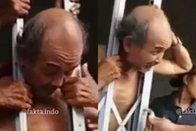 Viral, Kepala Pria Paruh Baya Ini Nyangkut di Pintu Besi Ruko! Kok Bisa?