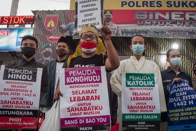 FOTO: Aksi Toleransi Antar Umat Beragama