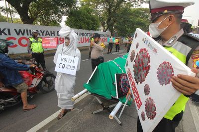 FOTO: Sosialisasi Protokol Kesehatan di Suramadu