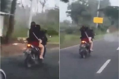Duh! Wanita Ini Ngamuk Pukuli Kepala Pacarnya Berkali-kali di Atas Motor saat Melaju