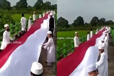 Rayakan Kemerdekaan RI, Puluhan Bocah Ini Bentangkan Bendera Merah Putih 76 Meter di Jambi