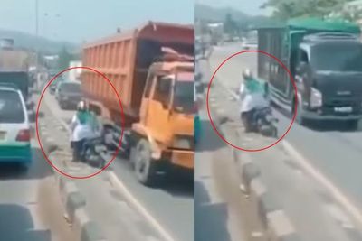 Aksi Emak-emak Bawa Motor Lawan Arah di Tengah Jalan, Nyaris Diserempet Truk