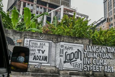 FOTO: Mural Kritik Sosial di Jakarta