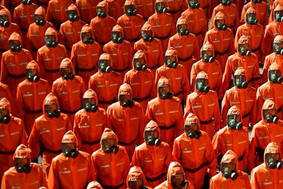 Tentara Korea Utara Memakai Setelan Hazmat di Perayaan Parade Militer Kim Jong-un