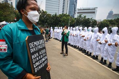 FOTO: Aksi Perjalanan Satu Tahun Omnibus Law