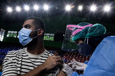 FOTO: Vaksinasi Untuk Para Pencari Suaka
