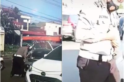 Salut! Momen Polisi Beraksi Menyelamatkan Anak Kucing yang Terjebak di Kolong Mobil