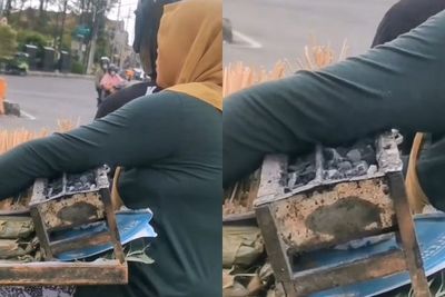 Viral Perjuangan Emak-Emak, Pangku Pemanggang Sate dengan Arang Menyala Tanpa Takut Panas