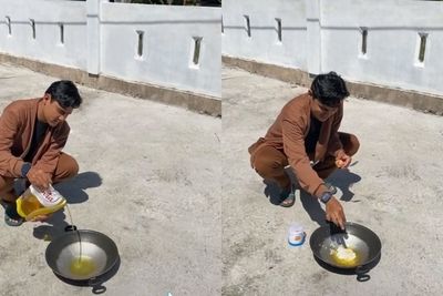 Enggak Perlu Kompor, Pria Ini Masak Telur Ceplok di Bawah Sinar Matahari