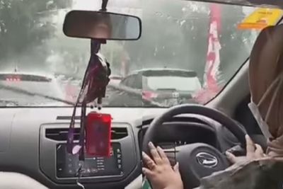 Viral Istri Polisi Jadi Sopir Taksi Online Demi Bantu Suami, Netizen Nyinyir: Oknum Itu