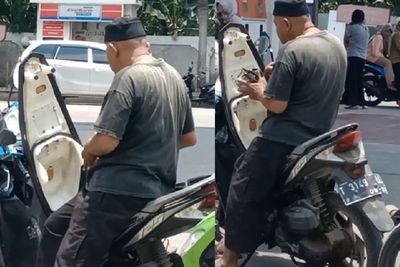Santuy Banget! Bapak Ini Sempet-sempetnya Makan Siang saat Antre Isi Bensin