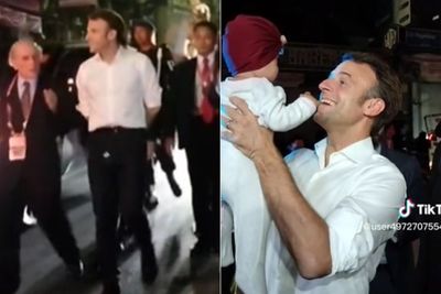 Nikmati Suasana Malam Bali, Presiden Prancis Jalan Kaki Sejauh 2 KM dan Gendong Bayi