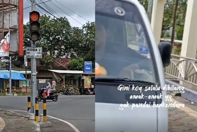 Momen Emak-Emak Marah ke Pengendara Mobil yang Mau Terobos Lampu Merah