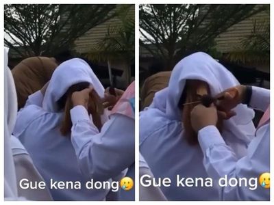 ﻿Viral Video Guru Mencukur Rambut Siswa Berhijab, Apa yang Salah?