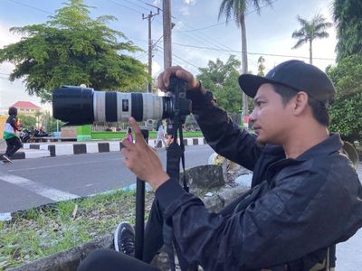 Keren! Pemuda ini Bisa Dapat Jutaan Rupiah Per Hari dari Foto-foto di Jalan