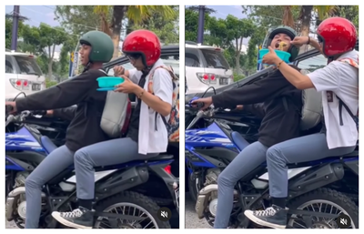 Momen Gemas Siswa SMA Makan Bekal di Atas Motor, Gak Lupa Suapin Teman yang Bonceng