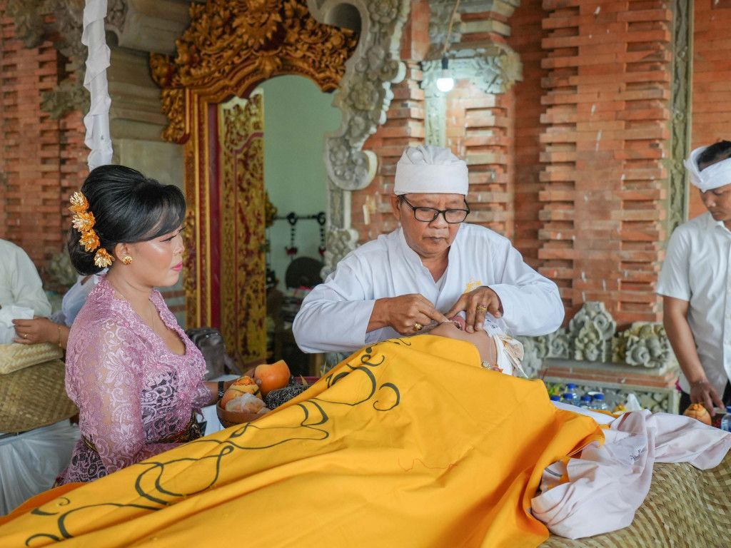Ringankan Beban Umat Hindu, PHDI Badung Gelar Upacara Metatah Bersama