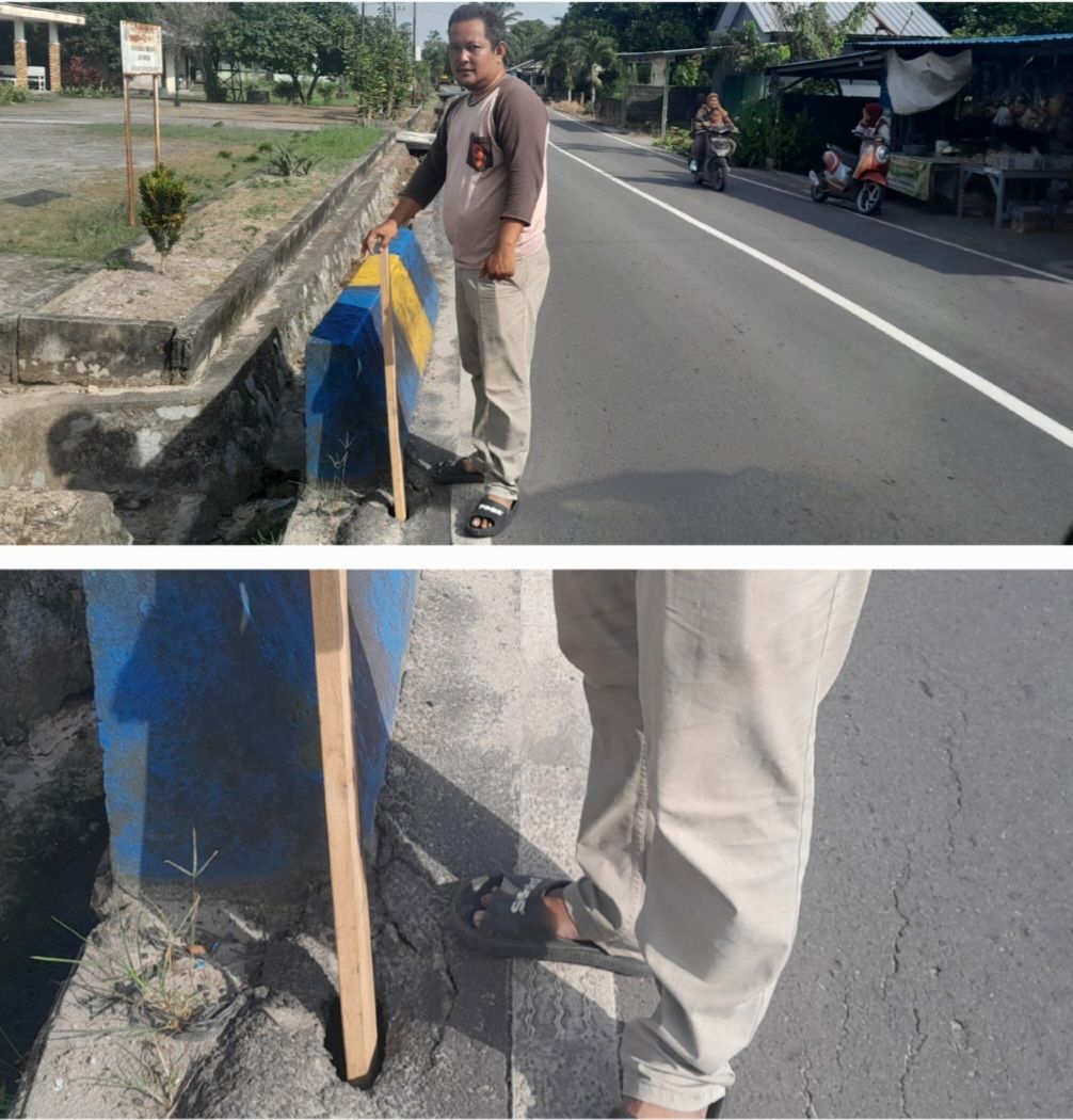 Ketua BPD Air Merbau Tandai Lubang Berbahaya di Pinggir Jalan Kerejan, Khawatir Sebabkan Kecelakaan