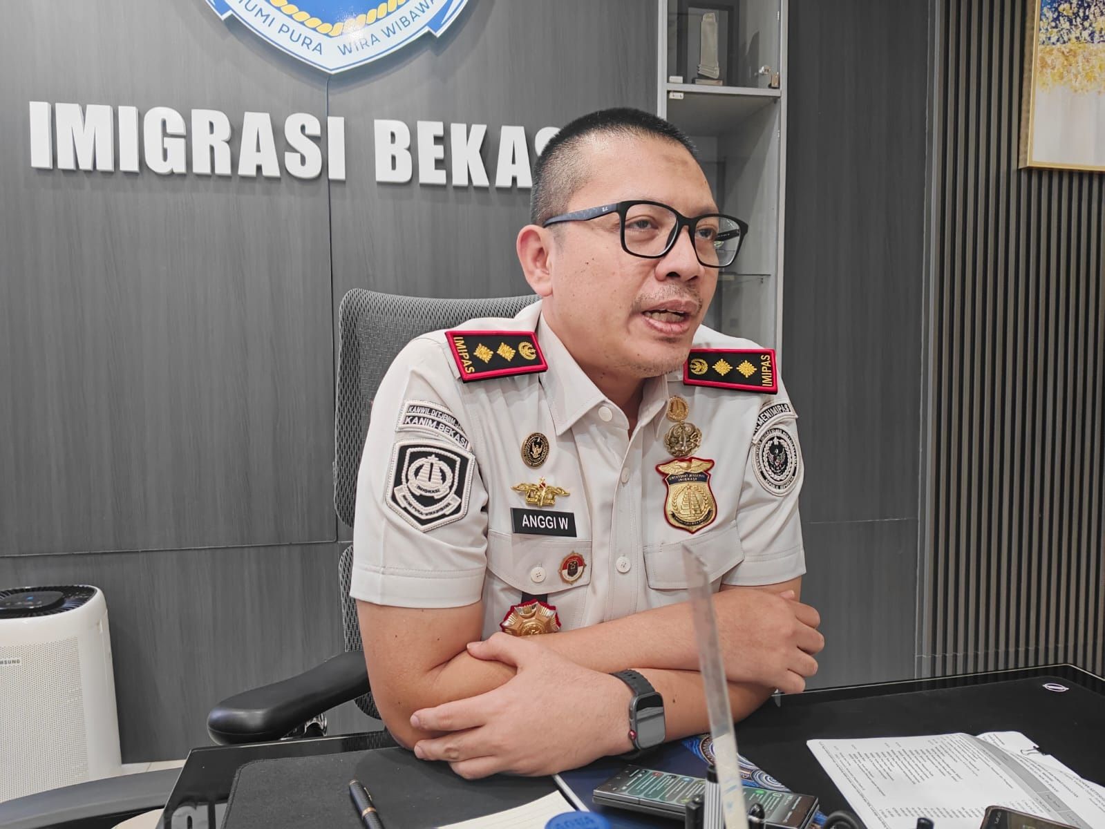 Imigrasi Bekasi Bebaskan Denda Untuk Pembuatan Paspor yang Rusak Akibat Banjir