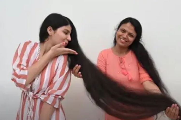 Penuh Haru, Remaja Pemilik Rambut Terpanjang di Dunia Potong Mahkotanya